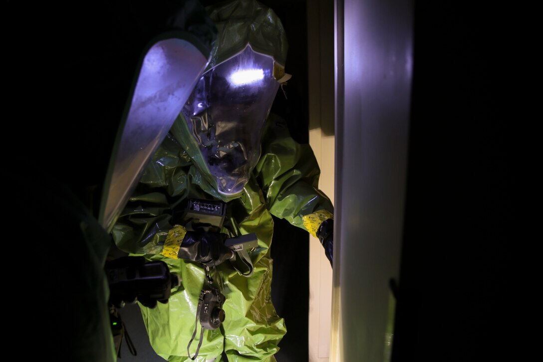 Lance Cpl. Jonathan White, chemical, biological, radiological and nuclear defense specialist and Lance Cpl. Weston Paulson, CBRN defense specialist with Combat Logistics Regiment 45, 4th Marine Logistics Group, Marine Forces Reserve conduct reconnaissance of an abandoned building during an assessment and consequence management team training exercise at Marine Corps Support Facility, New Orleans, Feb. 8, 2017. During the exercise, Marines practiced responding to a chemical threat. The Marines conducted area reconnaissance, sample collection and classification of unknown substances. (United States Marine Corps photo by Sgt. Ian Ferro/Published)