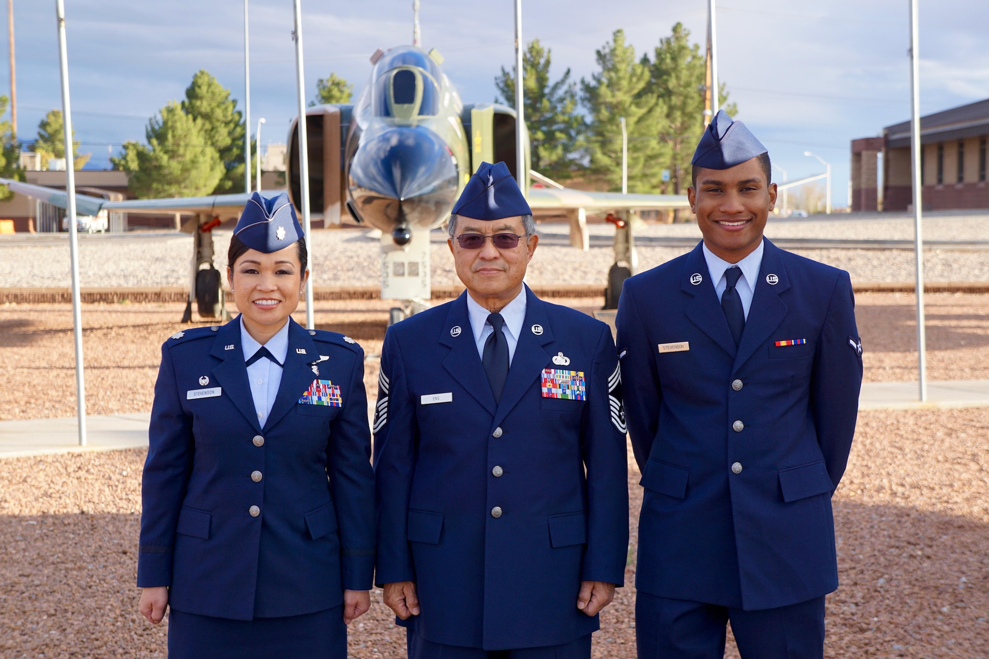 Lt. Col. Bonnie Stevenson, 49th Medical Operations Squadron commander, poses with her father, Chief Master Sergeant (Ret.) Bill Eng, and her son, Airman Darrius Stevenson. Airman Stevenson graduated from Air Force Basic Military Training at Lackland Air Force Base on Dec. 9, 2016. Airman Stevenson is currently receiving his Cyber Space Operation training at Keesler Air Force Base. (Photo courtesy of Lt. Col. Bonnie Stevenson)