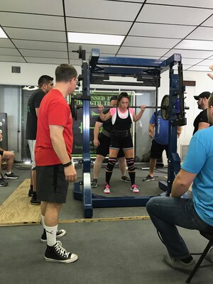 U.S. Army Sergeant First Class (SFC) Jennifer Palacios performs a squat during in the American Powerlifting Association (APA) Thunder Bay Throwdown. Palacios broke the Florida state squat record in the Raw Sub Master (33-39) age division by lifting 230lbs. (Courtesy photo)