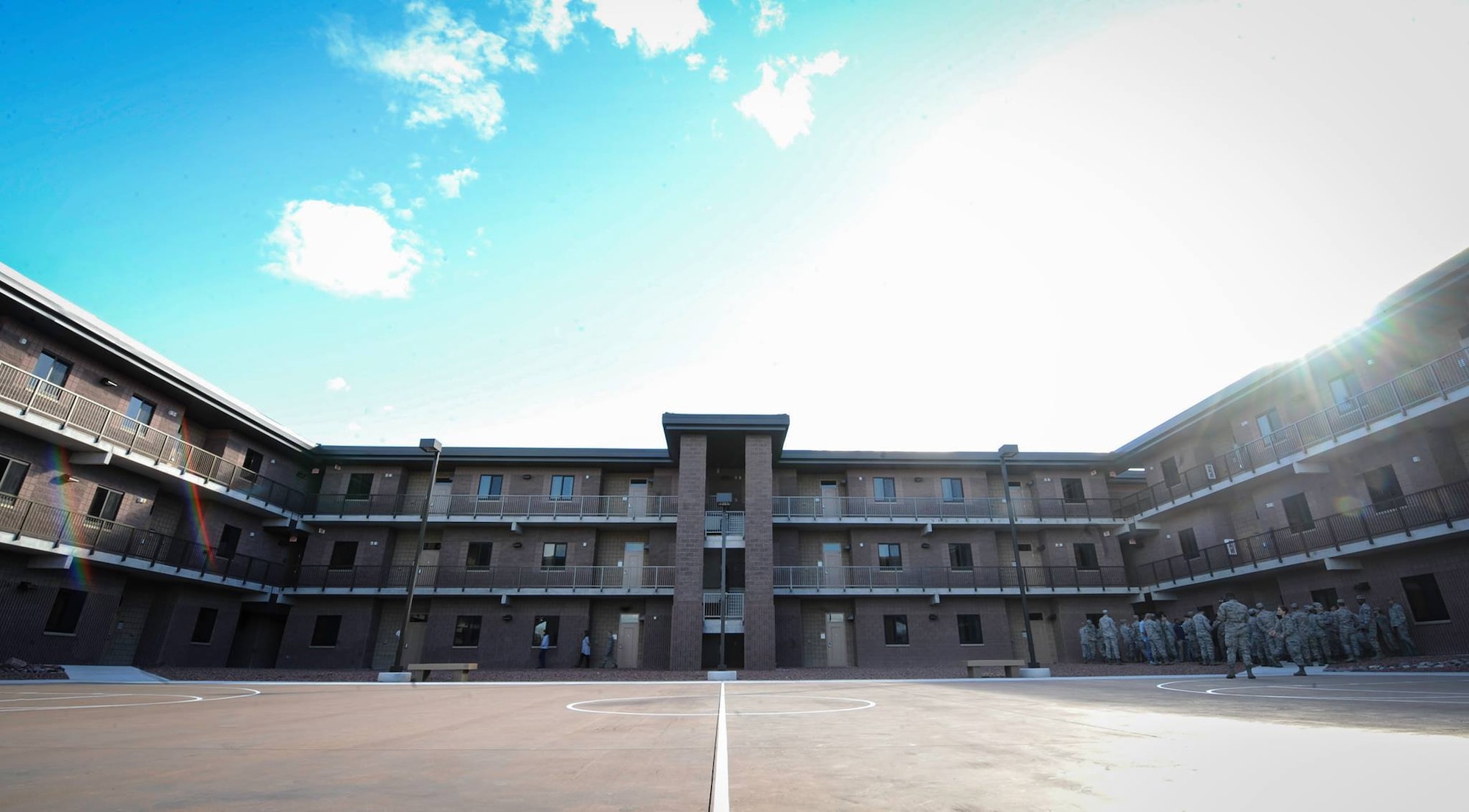 The new dormitory on Nellis Air Force Base, Nev., opened after a ribbon cutting ceremony, Feb. 3, 2017. Each module has a large kitchen and dining area along with a washer and dryer, with the interior finishes that are equivalent to what would be found in modern off-base condominiums. (U.S. Air Force photo by Airman 1st Class Kevin Tanenbaum/Released)