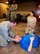 Aeromedical Staging Squadron (ASTS) Airmen take care of the patient as a team using the 