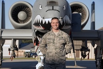 Chief Master Sgt. Jason Hughes, former 23d Aircraft Maintenance Squadron chief enlisted manager, poses in front of an A-10C Thunderbolt II, Feb. 10, 2017, at Moody Air Force Base, Ga. Upon enlisting as an F-15 Strike Eagle crew chief in 1997, Hughes dedicated 20 years to servicing six airframes. Now, he will become the newest member of the U.S. Air Force Thunderbirds. 