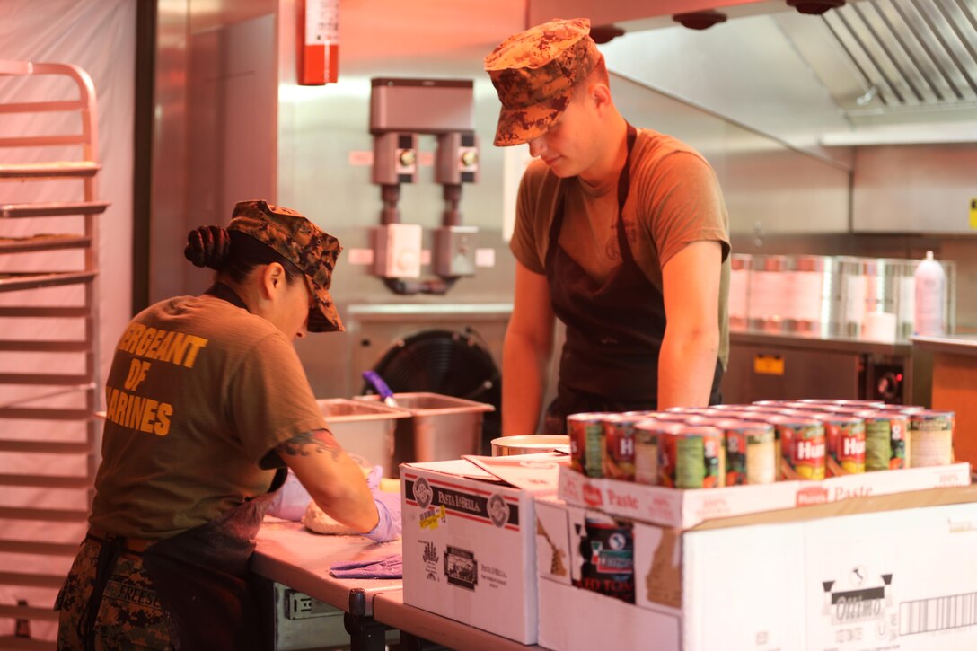 Food service Marines with II Marine Expeditionary Unit Headquarters Group prepare food during the Maj. Gen. William Pendleton Thompson Hill Awards for Food Service Excellence competition at Camp Lejeune, N.C., Feb. 15, 2017. The awards were created to recognize Marine Corps mess operations for their outstanding performance. (Marine Corps photo by Cpl. Shannon Kroening)