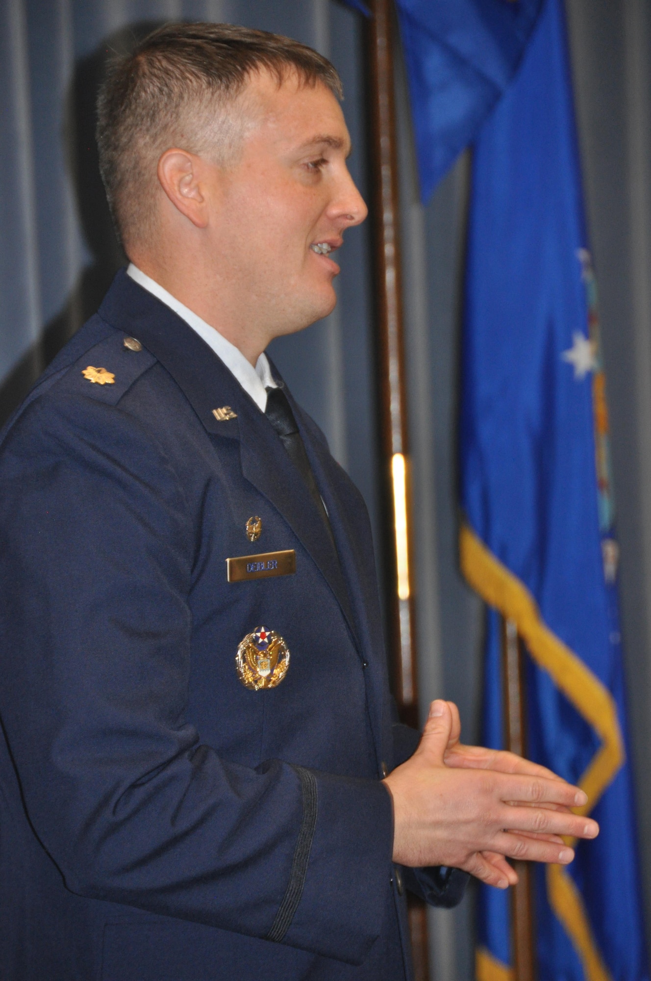 689th Network Operations Squadron Commander, Maj. Kevin Deibler, talks to audience members in attendance following his Assumption of Command ceremony Feb. 12, at Gunter Annex. The 689th is one of the newest units in the Air Force’s Cyber fight. (U.S. Air Force photo by Bradley J. Clark)