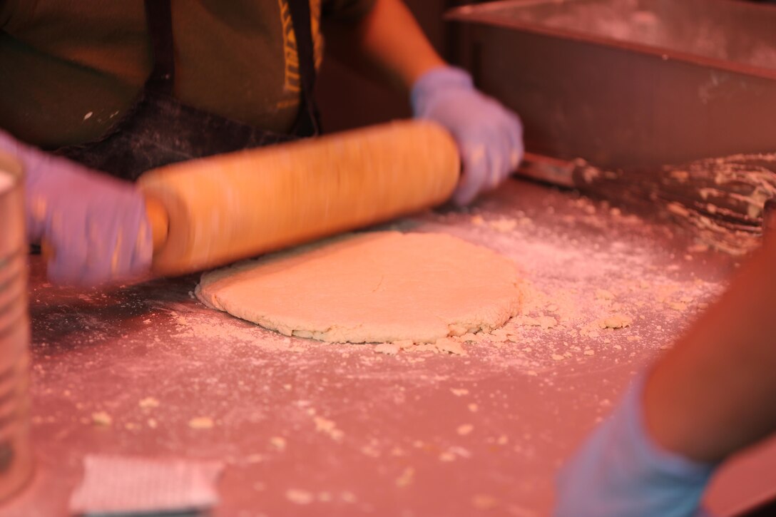 Food service Marines with II Marine Expeditionary Force II Marine Headquarters group prepare dough during the Maj. Gen. William Pendleton Thompson Hill Awards for Food Service Excellence competition at Camp Lejeune, N.C., Feb. 15, 2017. The awards were created to recognize Marine Corps mess operations for their outstanding performance. (Marine Corps photo by Cpl. Shannon Kroening)