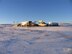 With the outside temperature at -15 F, conditions are none to pleasant at Launch Facility (LF) D-07, Malmstrom AFB, Montana on Jan 10, 2017.  Depot Maintenance Field Team members are appreciative of the new inflatable environmental shelter which is capable of being heated to an air temperature of 70+ degrees. (U.S. Air Force photo)