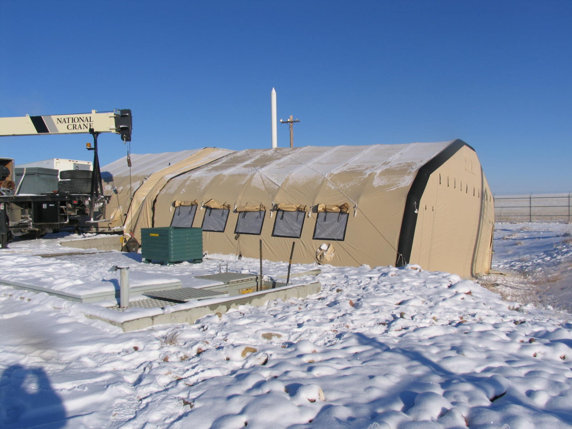 An inflatable shelter covers Launch Facility K-02 during Program Depot Maintenance at Malmstrom AFB, Montana, Feb. 8, 2017. (U.S Air Force photo)