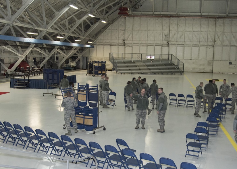 Airmen with the 11th Civil Engineer Squadron set up chairs in preparation for the Chief Master Sergeant of the Air Force Transition Ceremony at Joint Base Andrews, Md., Feb. 16, 2017. Four hundred chairs were placed to support the event, which will appoint the 18th Chief Master Sergeant of the Air Force, Kaleth O. Wright, on Feb. 17. (U.S. Air Force photo by Senior Airman Jordyn Fetter)