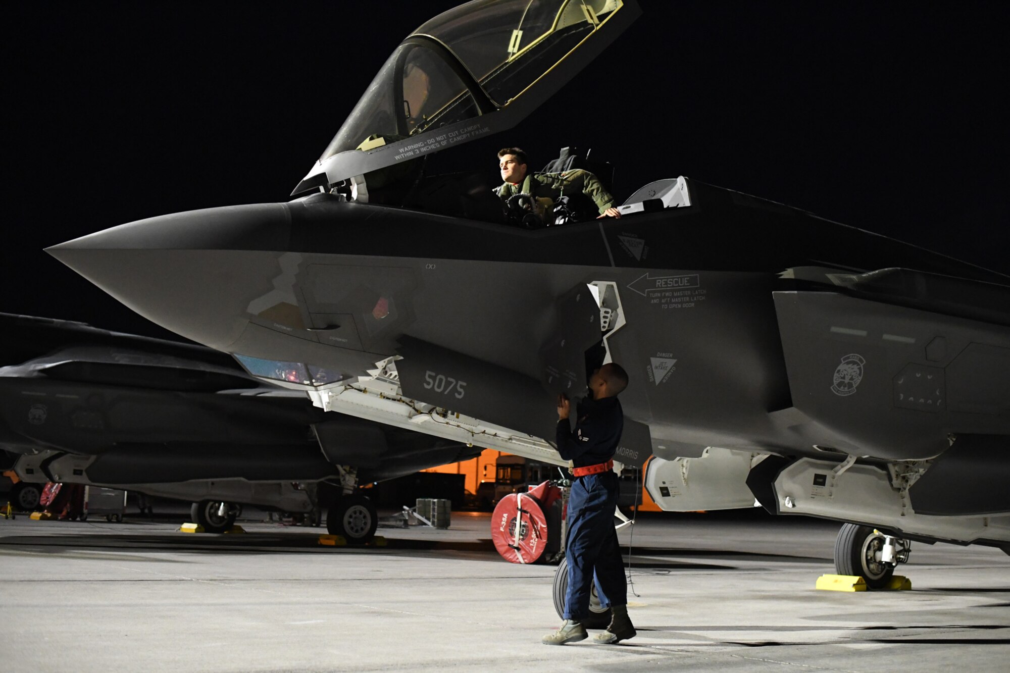 Lt. Col. Yosef Morris and Airman 1st class Raul Guzman, both 388th Fighter Wing, Hill Air Force Base, Utah, prepare for a sortie Feb. 3 at Nellis Air Force Base, Nevada, during Red Flag 17-1. (U.S. Air Force photo by R. Nial Bradshaw)