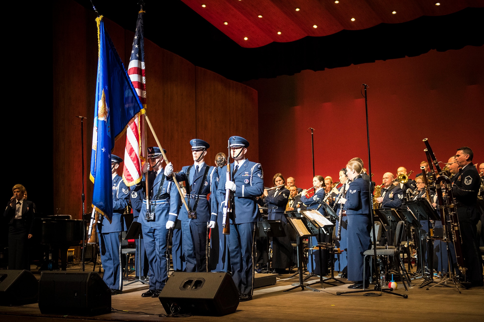 The Hill Air Force Base Honor Guard presents the U.S. flag during the national anthem Feb. 13 at Weber State University’s Austad Auditorium, Ogden, Utah. After the national anthem, the U.S Air Force Academy Band performed several musical pieces for the community during a free concert. (U.S. Air Force photo)