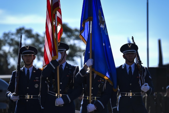 Members of the Hurlburt Field Honor Guard present the colors during the Ratchet 33 Memorial Ceremony at the air park, Hurlburt Field, Fla., Feb. 16, 2017. During the ceremony, the commanders of the 25th Intelligence Squadron, 34th Special Operations Squadron and the acting commander of the 319th SOS unveiled the Ratchet 33 aircrew memorial plaque. The aircrew was comprised of Capt. Ryan Hall, Capt. Nicholas Whitlock, 1st Lt. Justin Wilkens and Senior Airman Julian Scholten. (U.S. Air Force photo by Airman 1st Class Joseph Pick)