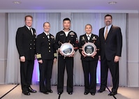 Naval Sea Systems Command (NAVSEA) Master Chief Russ Mason, NAVSEA Chief of Staff Capt. Renee Squier and NAVSEA Executive Director Jim Smerchansky pose with the 2016 NAVSEA Sailor of the Year winners: Electrician’s Mate 1st Class Disi Zhao (USN) and Master-at-Arms 1st Class Selene Ceballo (USNR).
