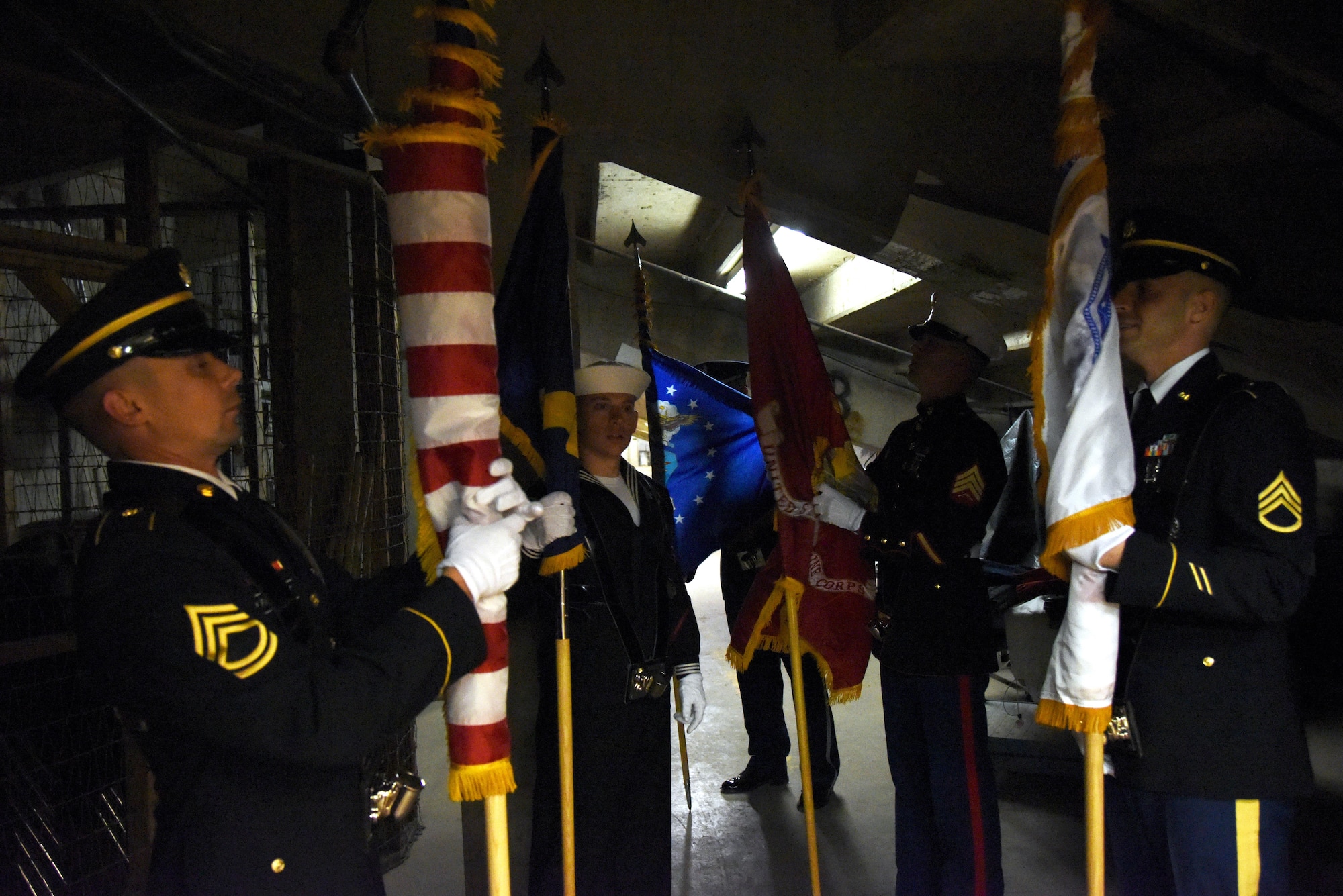 The Goodfellow Air Force Base Joint-Service Color Guard prepare to present the colors during the 85th Annual San Angelo Stock Show and Rodeo Military Appreciation Night at the Foster Communications Coliseum in San Angelo, Texas, Feb. 15, 2017. Goodfellow volunteers supported the rodeo by setting up pens, singing the national anthem and presenting the colors. (U.S. Air Force photo by Staff Sgt. Joshua Edwards/Released)