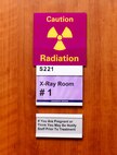 A sign warns patients of potential radiation dangers at the 341st Medical Support Squadron radiology clinic Feb. 15, 2017, at Malmstrom Air Force Base, Mont. Patients exposed to harmful levels of radiation can possibly have hazardous side effects including cancer, altering a person’s DNA and birthing children born with physical defects. (U.S. Air Force photo/Senior Airman Jaeda Tookes)