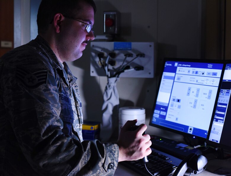Staff Sgt. Jason Spearow, 341st Medical Support Squadron NCO in charge of diagnostic imaging, administers an x-ray Feb. 15, 2017, at Malmstrom Air Force Base, Mont. Once the image is produced the technician views it on a computer monitor to ensure the diagnostic image is correct. (U.S. Air Force photo/Senior Airman Jaeda Tookes)