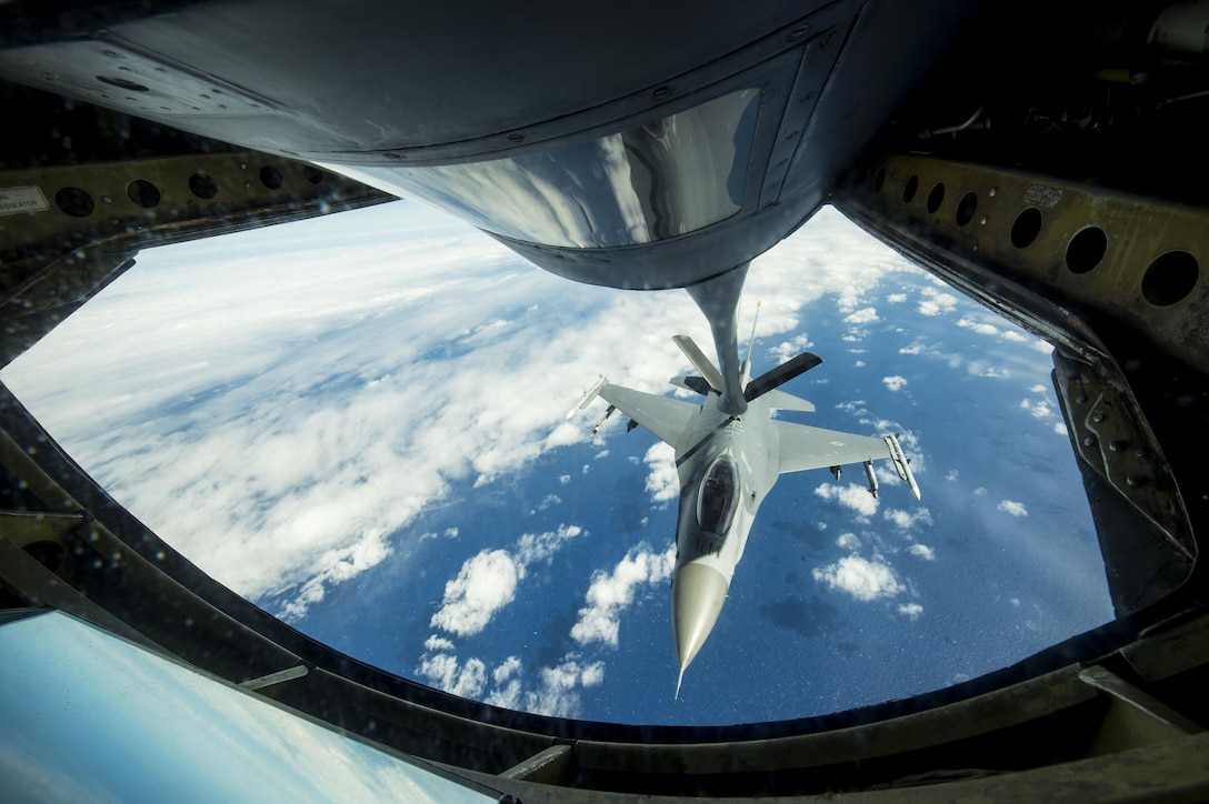 A U.S. Air Force F-16 receives fuel from a KC-135 Stratotanker during Cope North 2017 in the skies near Guam, Feb. 16, 2017. The exercise includes 22 total flying units and more than 1,700 personnel from three countries. The intent is the growth of strong, interoperable relationships within the Indo-Asia-Pacific region by integrating airborne and land-based command and control assets. The F-16 is assigned to the 14th Fighter Squadron. Air Force photo by Senior Airman Keith James