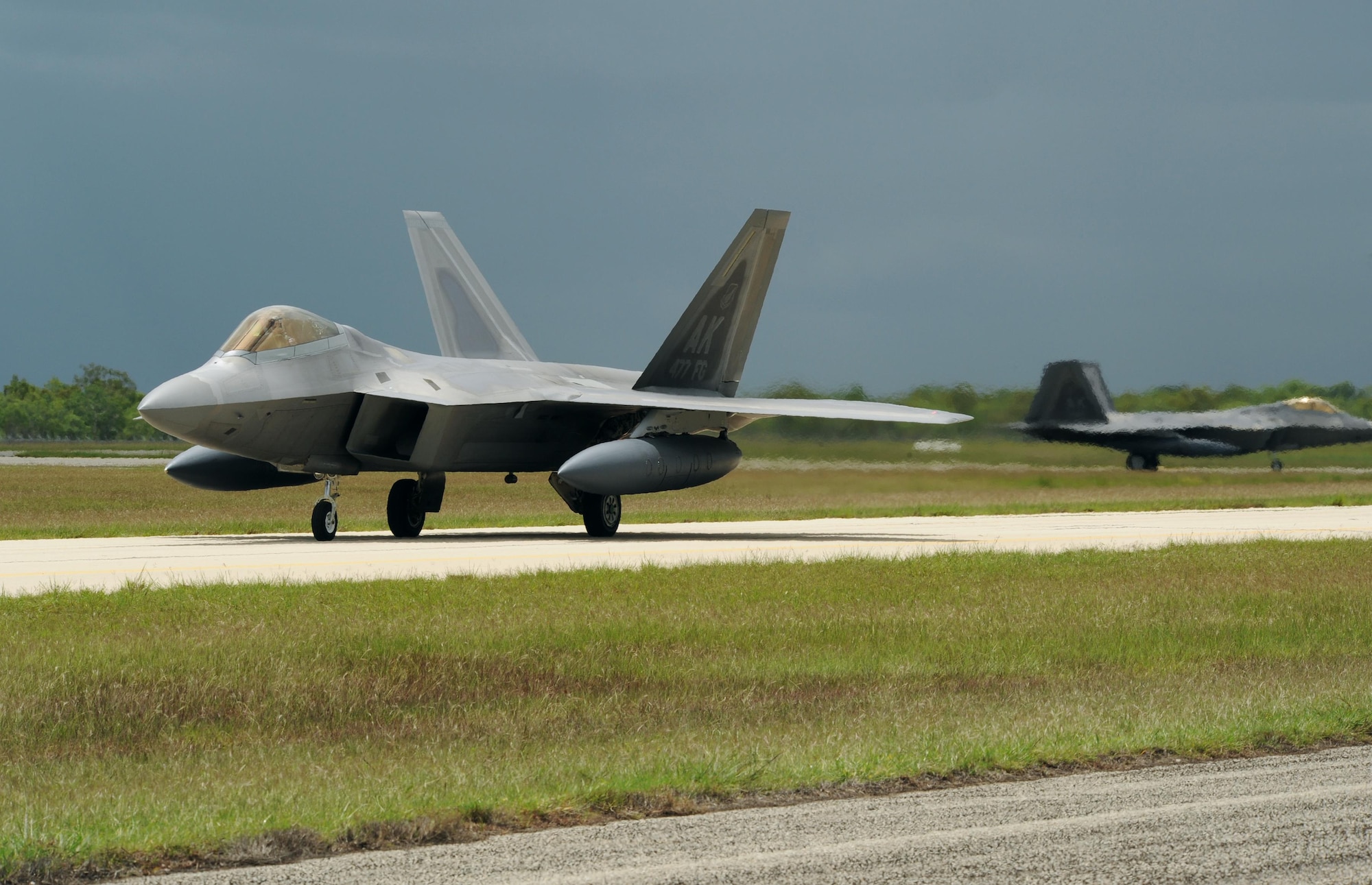 A U.S. Air Force F-22 Raptor assigned to the 90th Fighter Squadron, Joint Base Elmendorf-Richardson, Alaska, taxies on the runway at Royal Australian Air Force (RAAF) Base Tindal, Feb. 13, 2017. Twelve F-22 Raptors and approximately 200 Airmen are at RAAF Base Tindal as part of the Enhanced Air Cooperation (EAC) Initiative under the Force Posture Agreement between the U.S. and Australia. EAC creates the foundation for an enhanced rotational presence of U.S. military personnel in Australia to promote interoperability, build upon our already strong alliance, and reaffirm our commitment to the Indo-Asia-Pacific region. (U.S. Air Force photo/Staff Sgt. Alexander Martinez)