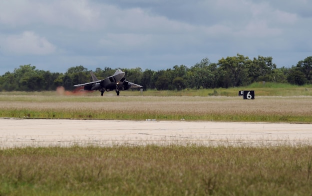 A U.S. Air Force F-22 Raptor assigned to the 90th Fighter Squadron, Joint Base Elmendorf-Richardson, Alaska, lands at Royal Australian Air Force (RAAF) Base Tindal, Feb. 13, 2017. Twelve F-22 Raptors and approximately 200 Airmen are at RAAF Base Tindal as part of the Enhanced Air Cooperation (EAC) Initiative under the Force Posture Agreement between the U.S. and Australia. EAC creates the foundation for an enhanced rotational presence of U.S. military personnel in Australia to promote interoperability, build upon our already strong alliance, and reaffirm our commitment to the Indo-Asia-Pacific region.  (U.S. Air Force photo/Staff Sgt. Alexander Martinez)