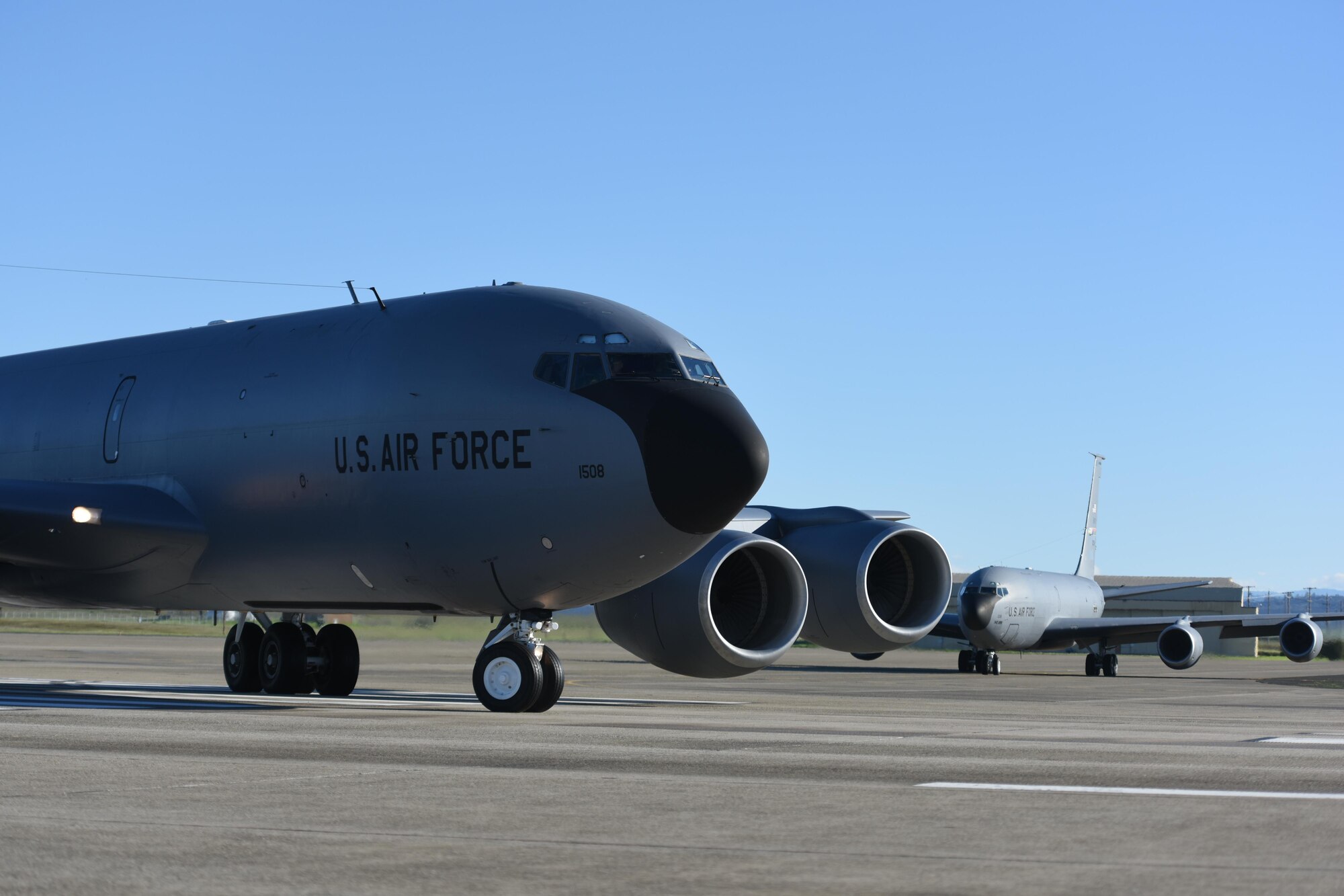 A KC-135 Stratotanker from the 314th Air Refueling Squadron turns the corner as it taxis down the runway as part of a two-ship aircraft formation on Saturday Feb. 11, 2017 at Beale Air Force Base, California during a unit training assembly. The two aircraft took off minutes apart as part of a routine training sortie. Between the two aircraft, they refueled eight F-15 Eagles from the 173rd Fighter Wing stationed at Kingsley Field Air National Guard Base, Oregon. (U.S. Air Force photo by Staff Sgt. Brenda Davis).