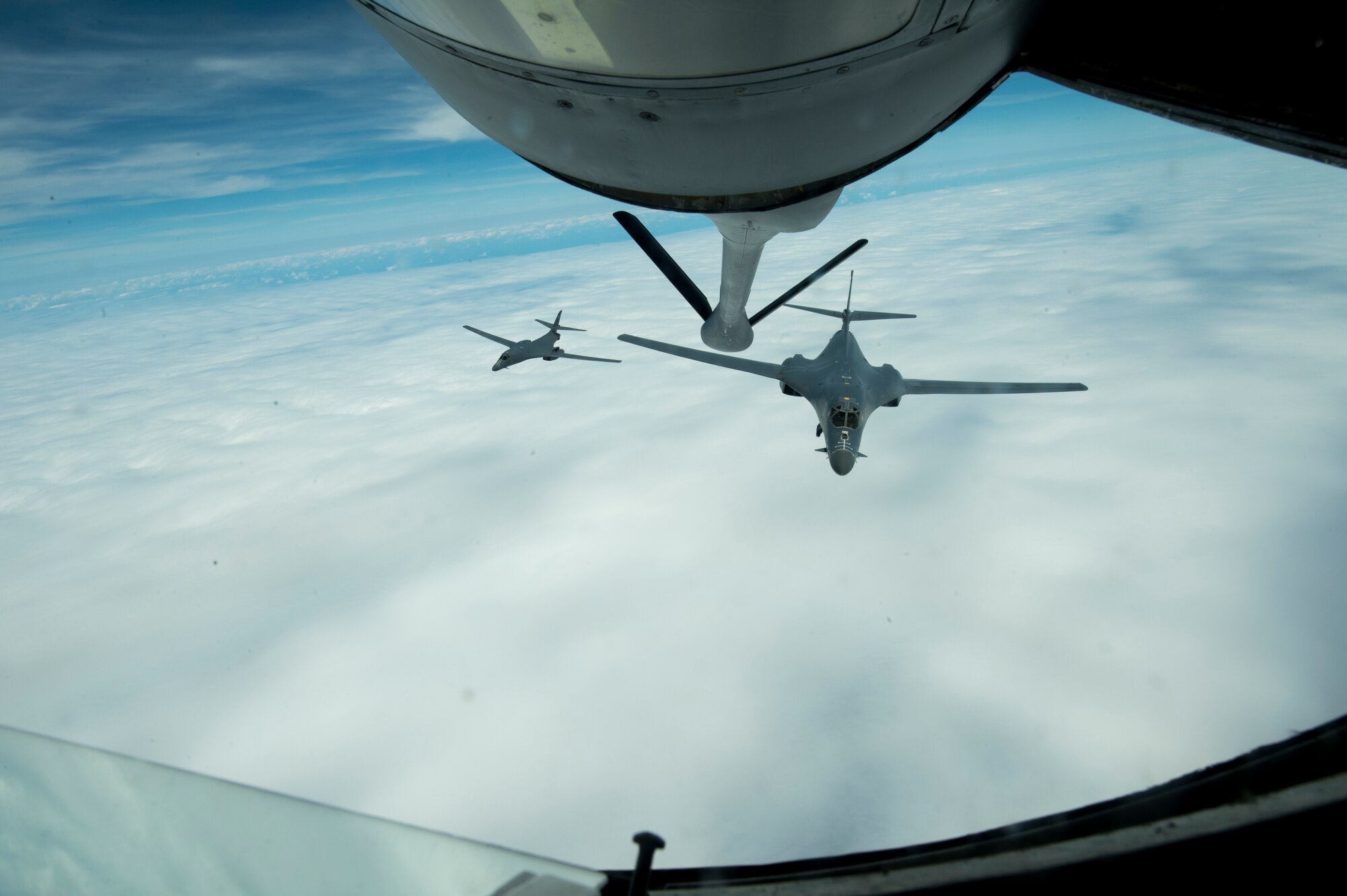 U.S. Air Force B-1B Lancers assigned to the 9th Expeditionary Bomb Squadron prepare to depart after receiving an in-flight refuel from a KC-135 Stratotanker during Cope North 2017, Feb. 16, 2017. The exercise includes 22 total flying units and more than 1,700 personnel from three countries and continues the growth of strong, interoperable relationships within the Indo-Asia-Pacific region through integration of airborne and land-based command and control assets. (U.S. Air Force photo by Senior Airman Keith James)