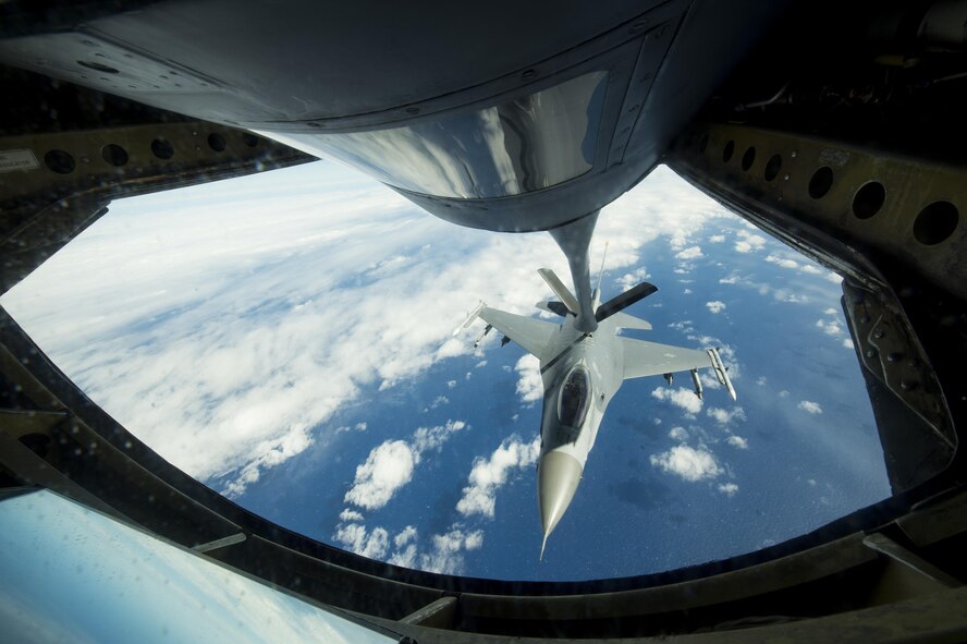 A U.S. Air Force F-16 assigned to the 14th Fighter Squadron from Misawa Air Base, Japan, receives an in-flight refuel from a KC-135 Stratotanker during Cope North 2017, Feb. 16, 2017. The exercise includes 22 total flying units and more than 1,700 personnel from three countries and continues the growth of strong, interoperable relationships within the Indo-Asia-Pacific Region through integration of airborne and land-based command and control assets. (U.S. Air Force photo by Senior Airman Keith James)