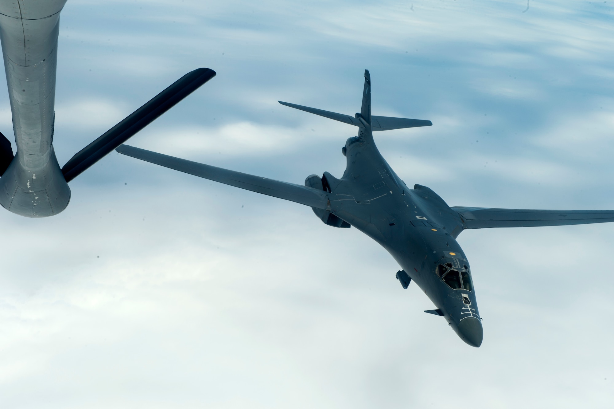 U.S. Air Force B-1B Lancers assigned to the 9th Expeditionary Bomb Squadron depart from the boom pod of a KC-135 Stratotanker after receiving an in-flight refuel during Cope North 2017, Feb. 16, 2017. The exercise includes 22 total flying units and more than 1,700 personnel from three countries and continues the growth of strong, interoperable relationships within the Indo-Asia-Pacific region through integration of airborne and land-based command and control assets. (U.S. Air Force photo by Senior Airman Keith James)