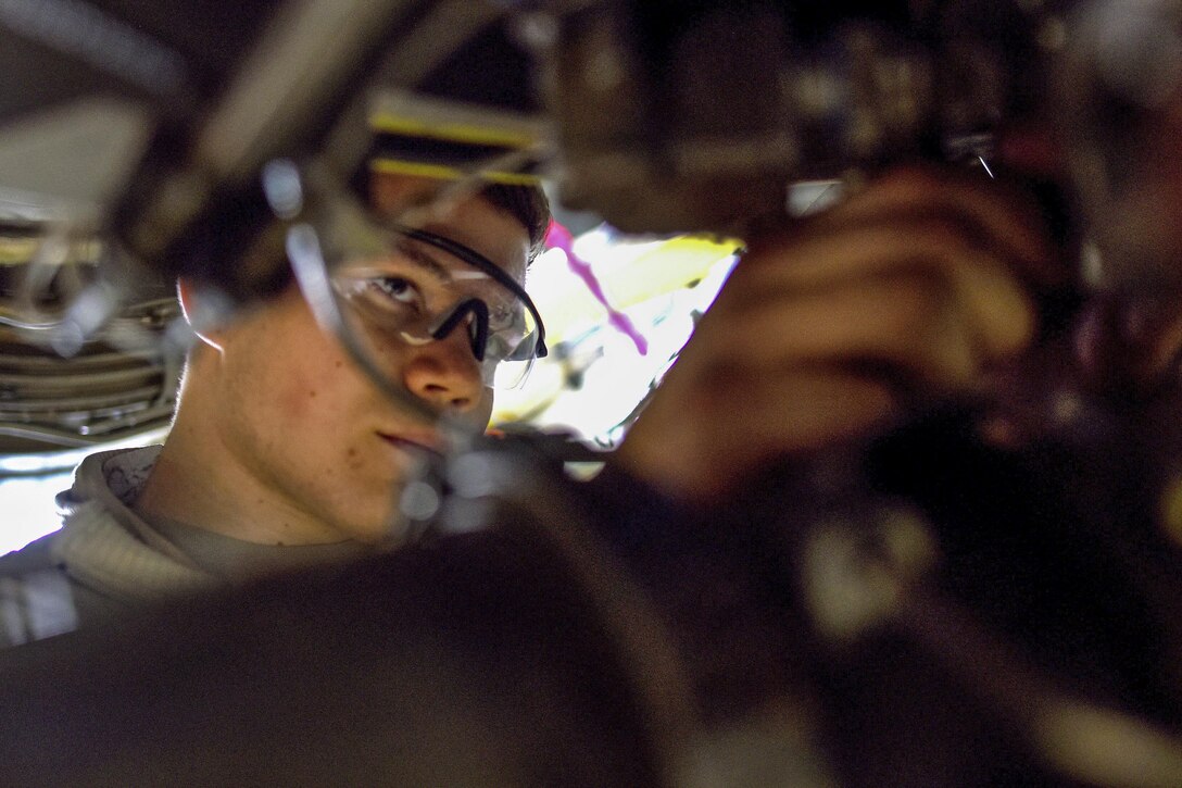 Air Force Airman 1st Class Casey McNamara seats a connector on the engine of a KC-135R  Stratotanker at Rickenbacker Air National Guard Base, Ohio, Feb. 15, 2017. McNamara, assigned to the 121st Air Refueling Wing, performed an inspection on the aircraft, which recently had returned from maintenance. Air National Guard photo by Senior Master Sgt. Ralph Branson