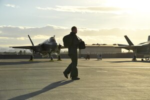 An F-35A aircraft pilot from Hill Air Force Base, Utah, walks away from his jet after a sortie Feb. 7 during Red Flag 17-1 at Nellis Air Force Base, Nevada. (U.S. Air Force photo by R. Nial Bradshaw)