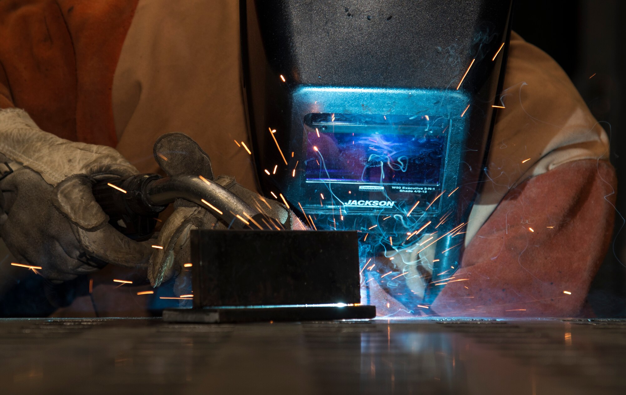 U.S. Air Force Airman 1st Class Elfie Diltz, a 35th Maintenance Squadron aircraft metals technology technician, welds steel bars together at Misawa Air Base, Japan, Feb. 1, 2017. Once Airmen have arrived to Misawa, they are given one year to complete their certifications work on aircraft. After receiving credentials, they work to further their welding skills. (U.S. Air Force photo by Airman 1st Class Sadie Colbert)