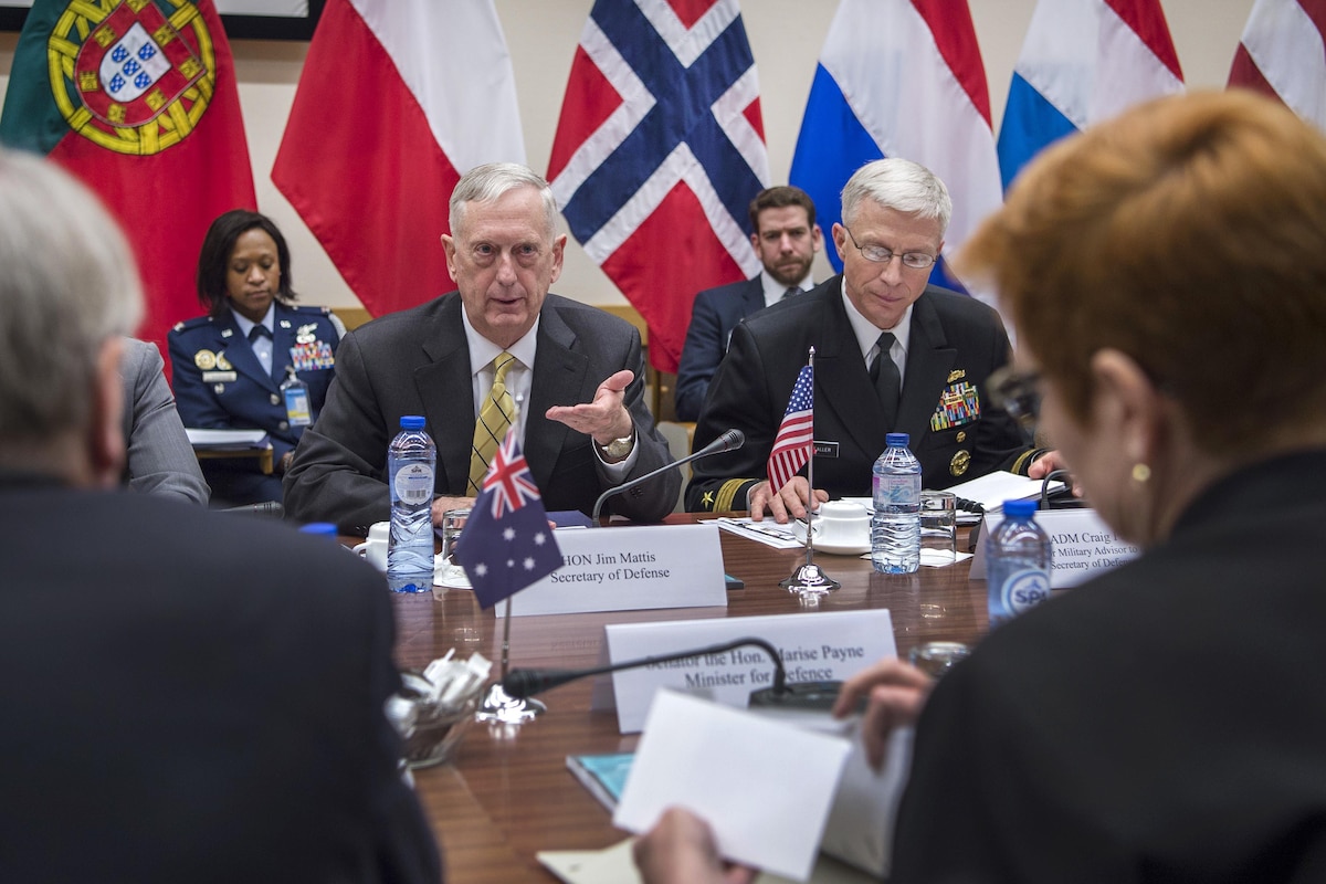 Defense Secretary James N. Mattis gestures as he meets with the Australian defense minister.