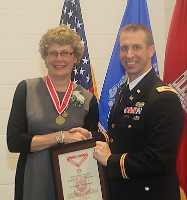 Dr. Jackie Richter-Menge was recently awarded the U.S. Army Engineer Association’s Bronze Order of the de Fleury Medal by Army Captain Joseph Marut during her retirement ceremony at the U.S. Army Engineer Research and Development Center’s Cold Regions Research and Engineering Laboratory.