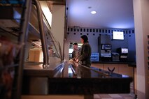 Ramstein Airmen wait in line to get their lunch at the Rheinland Dining Facility on Ramstein Air Base, Germany, Feb. 13, 2017. Last year, the 786th Force Support Squadron supported more than 1,900 professional military education students and 1,200 local Airmen. (U.S. Air Force photo by Airman 1st Class Savannah L. Waters)