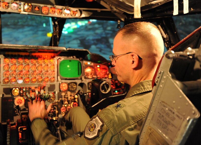 Brig. Gen. Michael Lutton, Principal Assistant Deputy Administrator for Military Application, National Nuclear Security Administration, flies in a B-52 simulator at Minot Air Force Base, N.D., Feb. 13, 2017. During his visit, Lutton toured various 5th Bomb Wing and 91st Missile Wing’s facilities to learn about their mission and capabilities. (U.S. Air Force photo by Senior Airman Kristoffer Kaubisch)