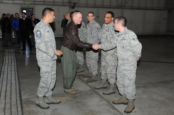Brig. Gen. Michael Lutton, Principal Assistant Deputy Administrator for Military Application, National Nuclear Security Administration, greets Airmen at Dock 7 at Minot Air Force Base, N.D., Feb. 13, 2017. During Lutton’s tour, he was briefed by Airmen about the B-52H Stratofortress’ weapons capabilities.  (U.S. Air Force photo by Senior Airman Kristoffer Kaubisch)