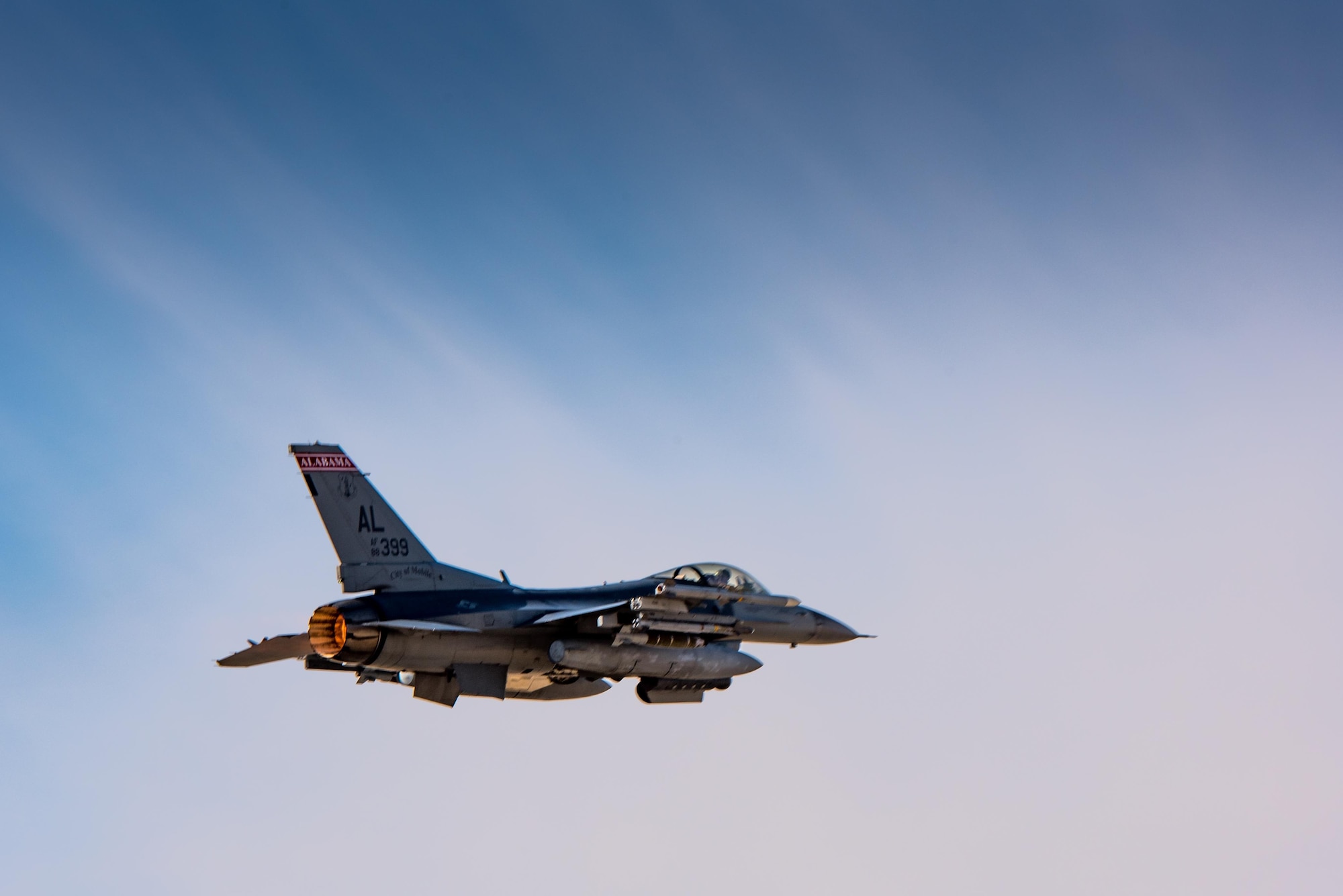 An F-16 from the Alabama Air National Guard flies a mission with the 134th Expeditionary Fighter Squadron in support of Operation Inherent Resolve at the 407th Air Expeditionary Group Dec. 13, 2016. The red tail flash of the jet brings the Tuskegee Airmen’s legacy back the 332nd Air Expeditionary Wing, to which the 134th EFS is currently assigned.  (U.S. Air Force photo/Master Sgt. Benjamin Wilson)(Released)