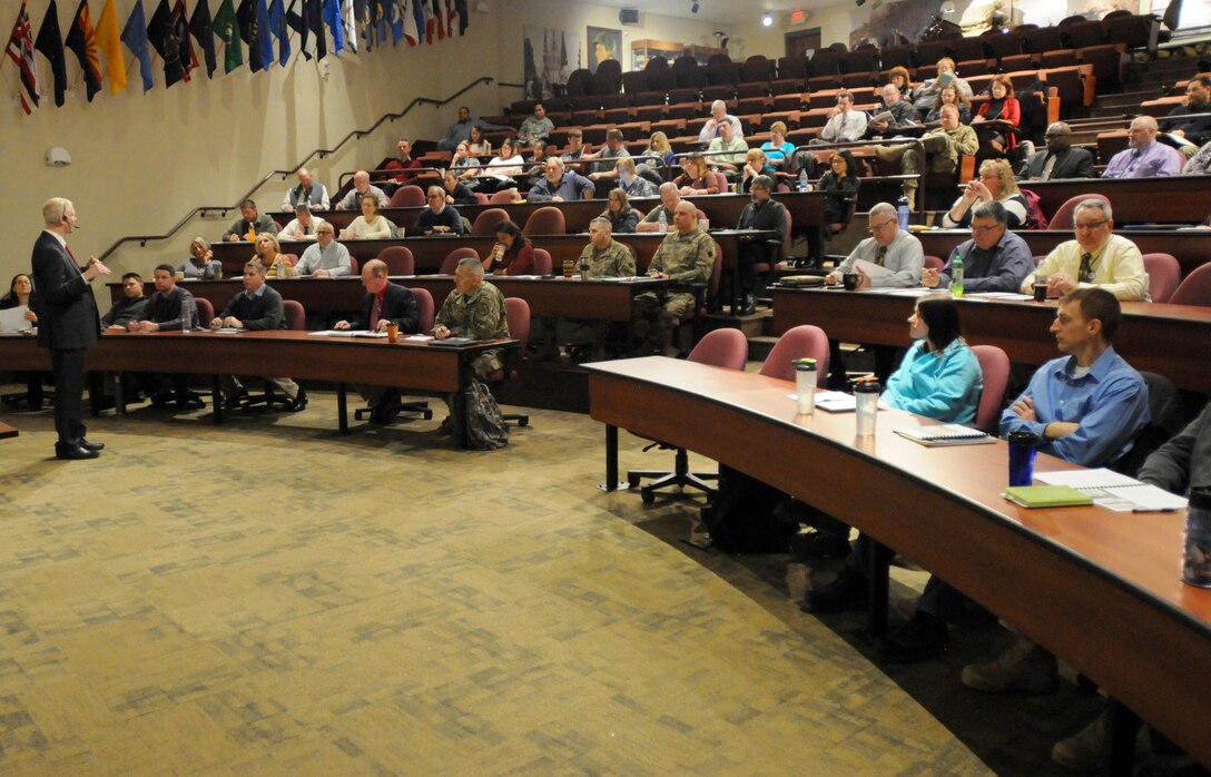 Soldier and Civilian leaders and supervisors listen as Dr. David Wetzel, a traveling presenter from SkillPath, discusses the Family and Medical Leave Act during a daylong training at the 88th Regional Support Command Headquarters on Fort McCoy, Wisconsin, Feb. 15.