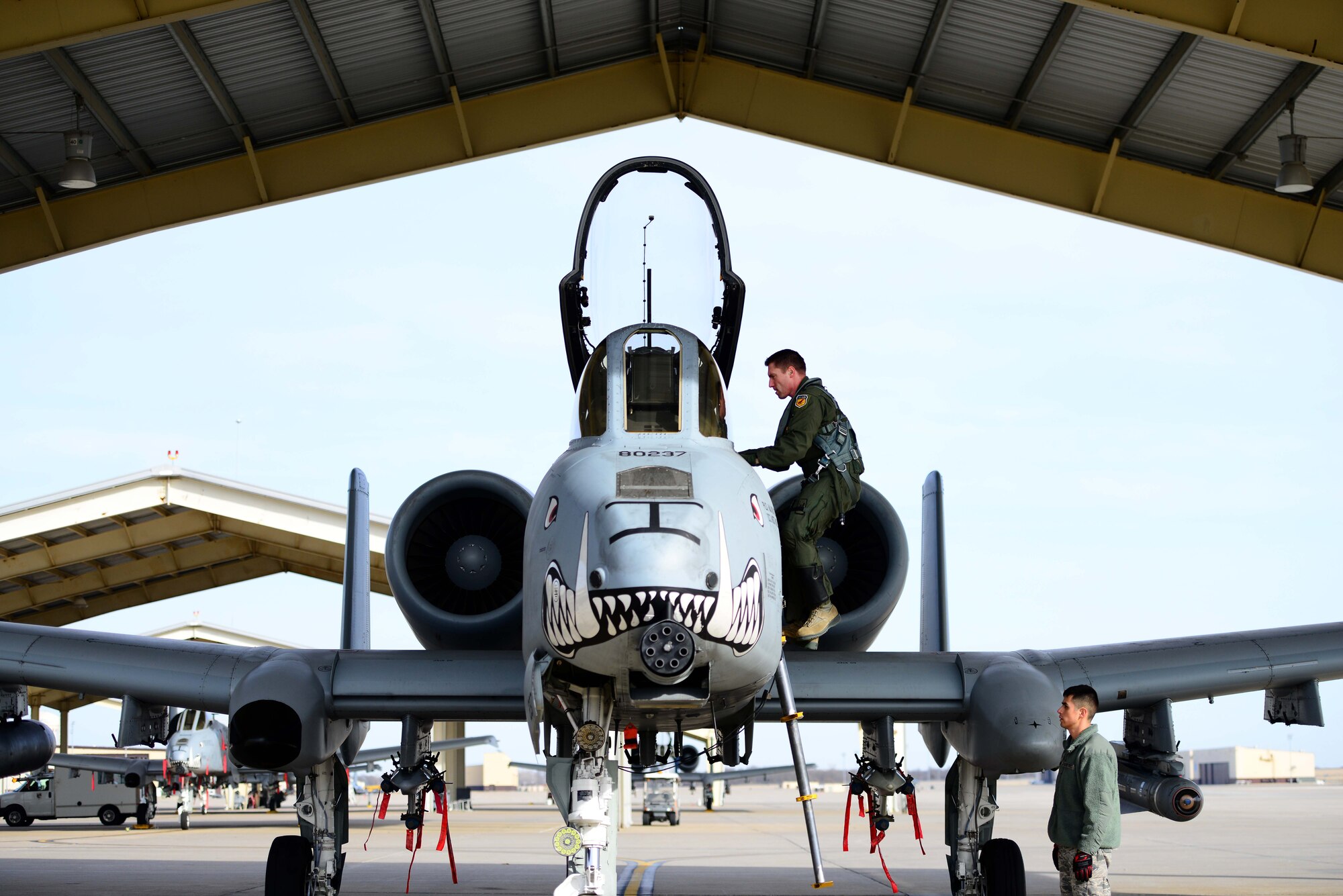 U.S. Air Force Lt. Col. Ryan Hodges, an A-10 Thunderbolt II pilot assigned to the 303rd Fighter Squadron, climbs into his aircraft during a local flying mission at Whiteman Air Force Base, Mo., Feb. 14, 2017. The A-10 Thunderbolt II has excellent maneuverability at low air speeds and altitude, and is a highly accurate and survivable weapons-delivery platform. The aircraft can loiter near battle areas for extended periods of time and operate in low ceiling and visibility conditions.