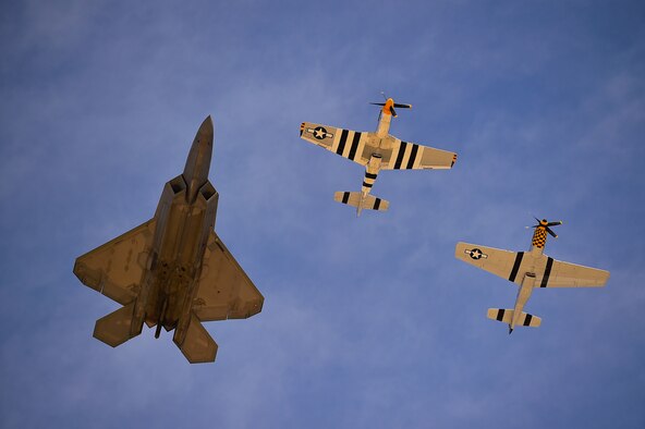 An F-22 Raptor performs a heritage flight during the 2017 Heritage Flight Training Course at Davis-Monthan Air Force Base, Ariz., Feb. 9, 2017. The program was established in 1997, allowing certified civilian pilots and Air Force pilots to perform flights together. (U.S. Air Force photo/Senior Airman Kimberly Nagle)