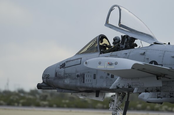 An A-10C Thunderbolt II taxies down the flightline during the 2017 Heritage Flight Training Course at Davis-Monthan Air Force Base, Ariz., Feb. 12, 2017. During the course, aircrews practiced ground and flight training to enable civilian pilots of historic military aircraft and Air Force pilots of current fighter aircraft to fly safely in formations together. (U.S. Air Force photo/Senior Airman Chris Drzazgowski)