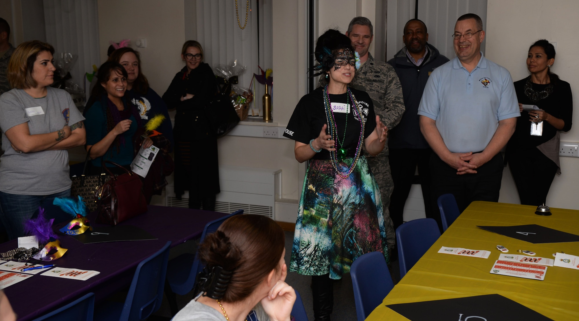 Sarai Boyd, center, Team Mildenhall Key Spouse and wife of U.S. Air Force Lt. Col. Christopher Boyd, 100th Comptroller Squadron commander, welcomes those in attendance at the Hearts Apart event Feb. 16, 2017, on RAF Mildenhall, England. The 100th Wing Staff Agency and 100th CPTS hosted this month’s Hearts Apart event. (U.S. Air Force photo by Airman 1st Class Tenley Long)