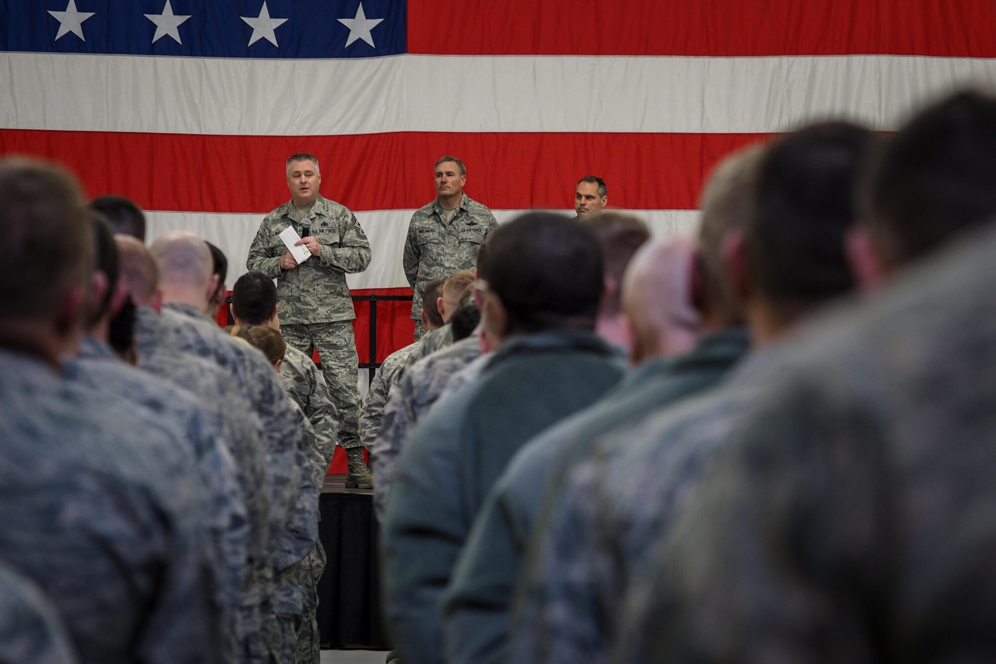 Airmen of the Global Vikings stand in formation as Chief Master Sgt. Anthony Mack, 934th Airlift Wing command chief, addresses the wing during the quarterly commander's call on Feb. 11.