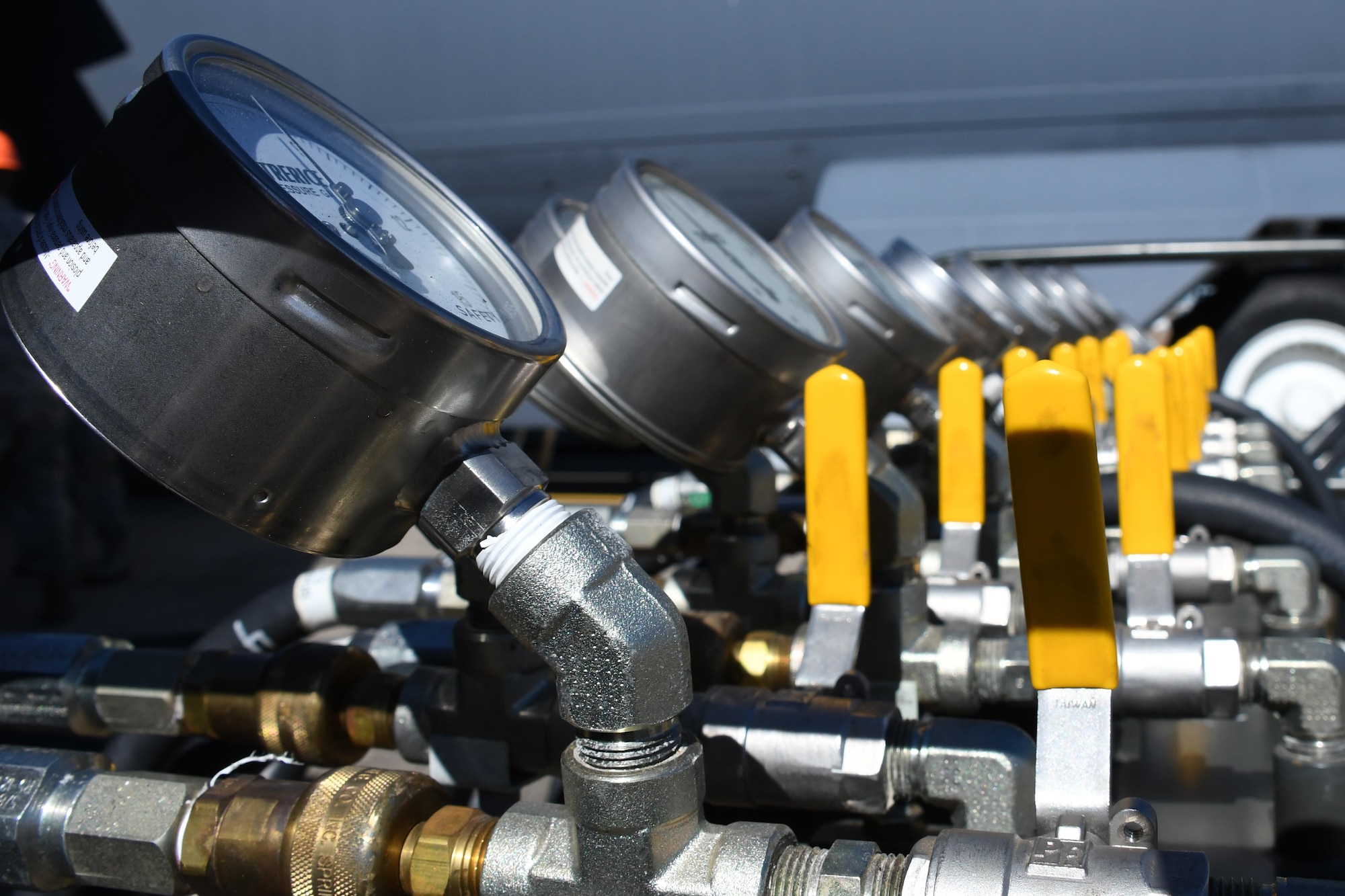 Gauges and valves for inflating aircraft lifting airbags stand ready for service at Barksdale Air Force Base, La., Feb. 16, 2017. These instruments were used to lift a B-52 Stratofortress with airbags simulating aircraft recovery after a landing gear failure. It is the first such exercise attempted with a B-52 in more than 30 years. (U.S. Air Force photo by Tech. Sgt. Ted Daigle/Released)
