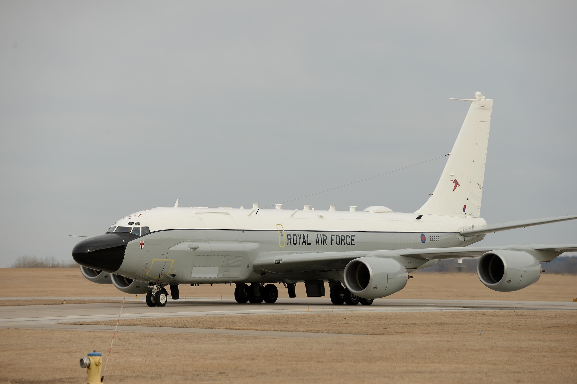 A Royal Air Force RC-135 Airseeker taxis down a taxiway at Offutt Air Force Base, Neb. Feb. 11. The aircraft diverted from Nellis Air Force Base to Offutt where it received maintenance assistance from the 55th Maintenance Group to correct a landing gear problem that occurred while participating in a joint exercise. (U.S. Air Force photo by Delanie Stafford)