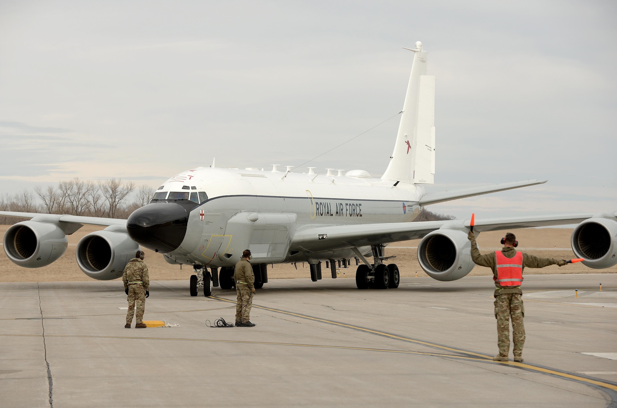 A Royal Air Force RC-135 Airseeker taxis into a parking spot at Offutt Air Force Base, Neb. Feb. 11. The aircraft diverted from Nellis Air Force Base to Offutt where it received maintenance assistance from the 55th Maintenance Group to correct a landing gear problem that occurred while participating in a joint exercise. (U.S. Air Force photo by Delanie Stafford)