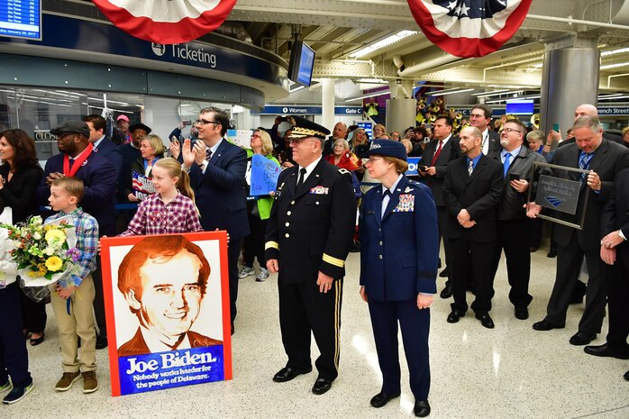 Maj. Gen. Frank Vavala, adjutant general, Delaware National Guard, Brig. Gen. Carol A. Timmons, and friends and family of the DNG wait for Joe and Jill Biden to arrive at  Wilmington Airport on Jan. 20, 2017. (U.S. National Guard photo by Staff Sgt. John Michaels