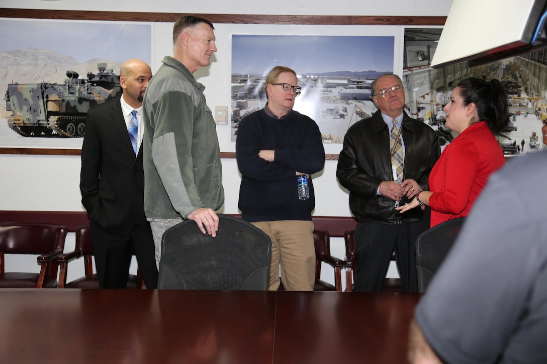 (Left) Christopher Camacho, Area Manager, DLA Disposition Services, Marine Corps Logistics Base Barstow; looks on as U.S. Air Force Lt. Gen. Andrew E. Busch, Director, Defense Logistics Agency; Kevin Lindsey, Operations Manager, DLA Distribution, MCLBB; and Brent Cox, Director, DLA Distribution, MCLBB; meet with Krista Perez, contracting officer, DLA assigned to Production Plant Barstow, Marine Depot Maintenance Command prior to Busch taking a windshield tour of PPB, Jan. 26.