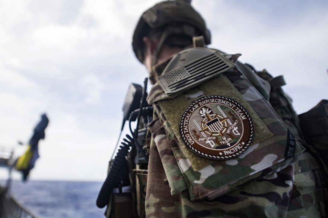 A Coast Guard law enforcement agent prepares to board a foreign flagged fishing vessel during an Oceania Maritime Security Initiative boarding mission in the Pacific Ocean, Feb. 5, 2017. Navy photo by Petty Officer 3rd Class Danny Kelley