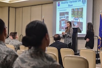 Alaine Mills, Health and Wellness Center health promotion dietitian, discusses healthy eating options on base during a Town Hall Meeting at the Charleston Club, Feb. 3. The Robert D. Gaylor Dining Facility will be closing March 1 for 10 months while repairs are made to the building. More than 400 Airmen living in the dormitories will receive basic allowance for subsistence (BAS) II, a total of $736.58 per month.
