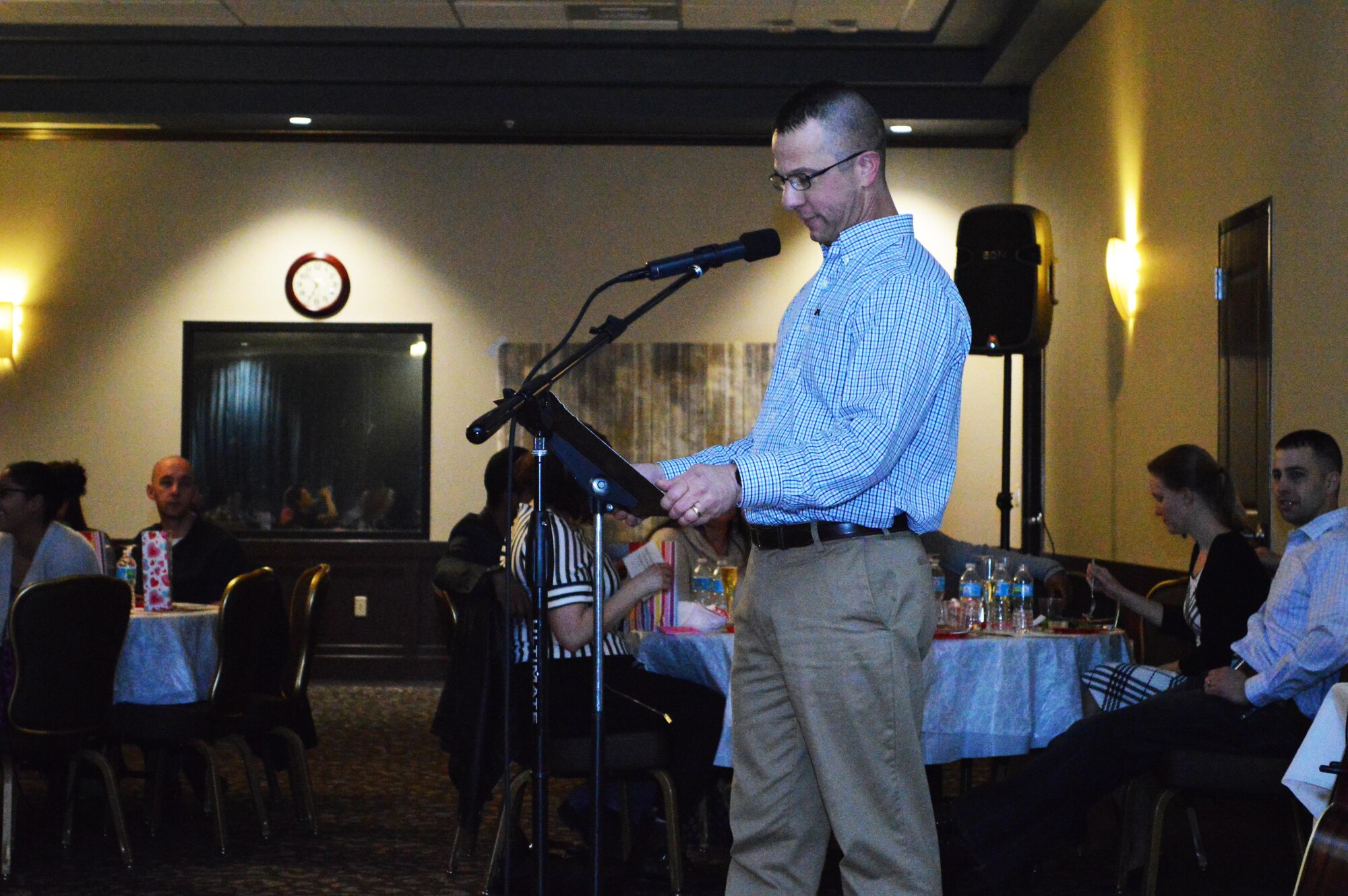 Chaplain (Capt.) Jeff McMillen, 92nd Air Refueling Wing chaplain, delivers an inspirational message about building stronger marriages during the Sweetheart Dinner marriage enrichment event, Feb. 11, 2017, at the Red Morgan Center on Fairchild Air Force Base, Washington. About 40 active duty and Air National Guard couples, and 5 retired military couples from the Fairchild community attended the dinner. (U.S. Air Force Photo/Capt. David Liapis)