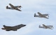 An F-35 Lightning II flies in formation with P-51 Mustangs during the Heritage Flight Training and Certification Course Feb. 9, 2017, at Davis-Monthan Air Force Base, Ariz. Heritage and demonstration teams need to be certified annually to participate in open houses and air shows worldwide. (U.S. Air Force photo by Senior Airman James Hensley)   